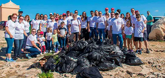 MAPFRE employees plant trees and hold clean up at Mellieha