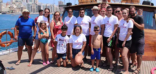 MAPFRE Malta employees volunteer to organise a boat trip for boys of St Patrick’s Residential Home
