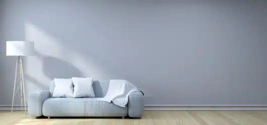 Minimalist,Interior,Design,light,Gray,Sofa,With,Lamp,On,Gray,Wall commercial home